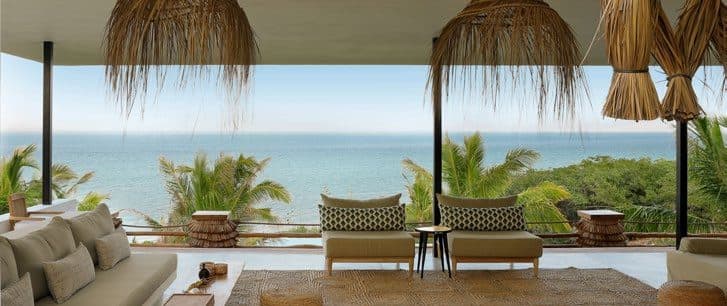 An ocean-facing lounge at Saudade, Vilanculos.